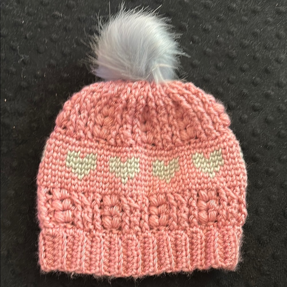 Pink and Gray Knit Hat with Textured Pattern and Pom Pom